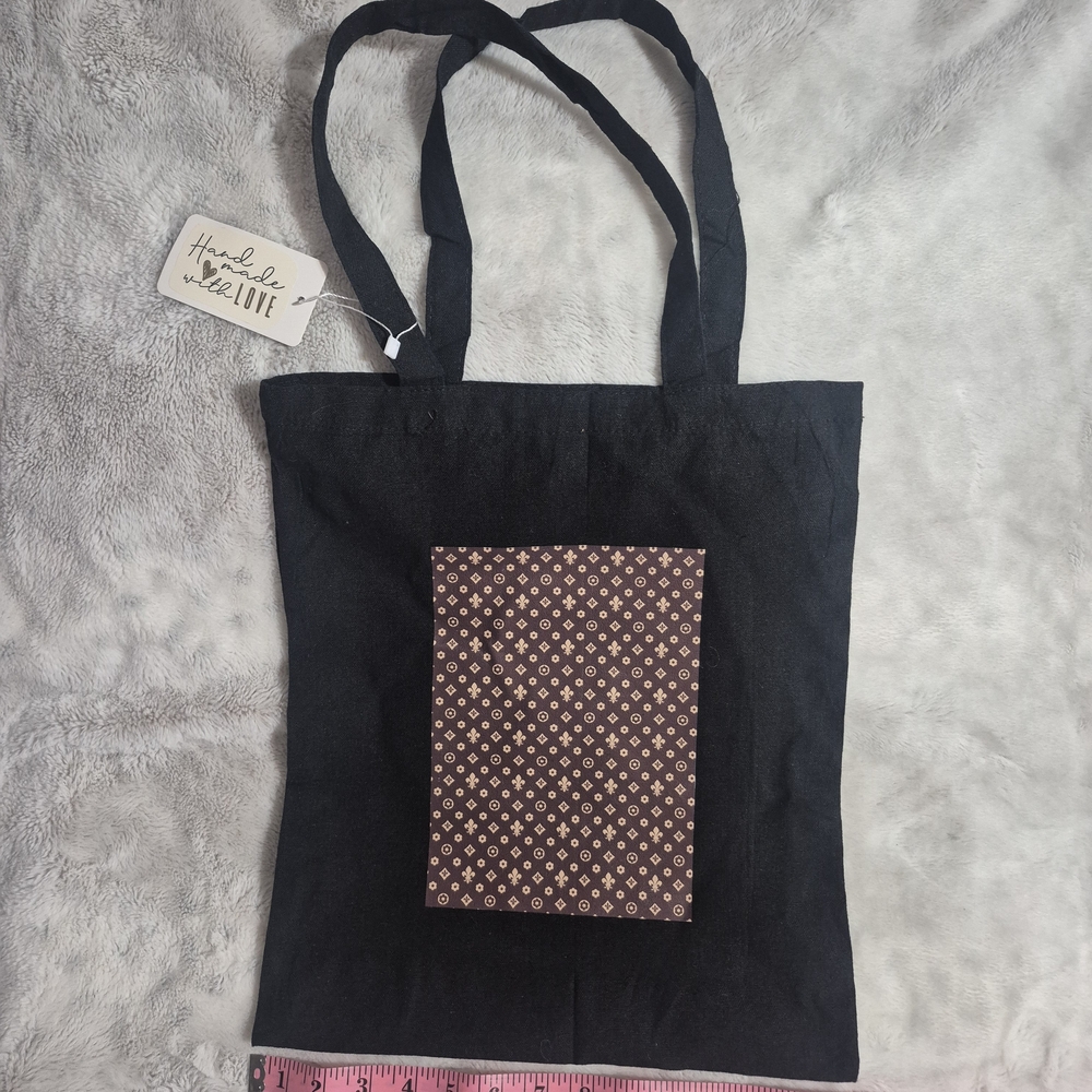 Elegant Black Tote Bag with Brown Pattern